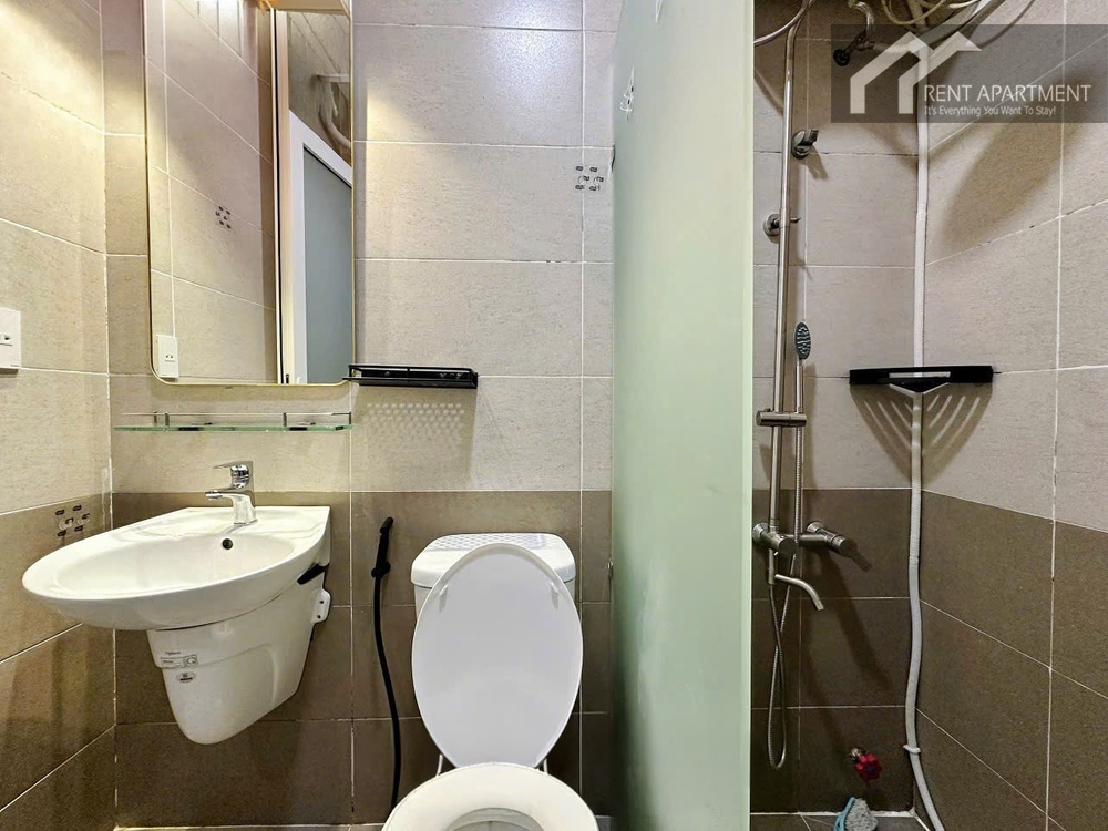 ID 2242 bathroom shower area with glass divider and vanity mirror
