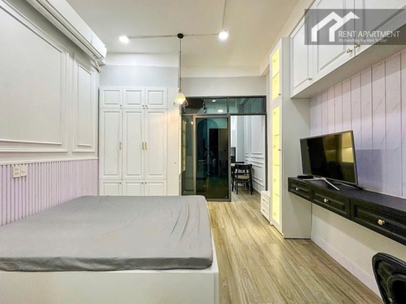 ID 2242 bedroom view showing bed white wardrobe and tv console