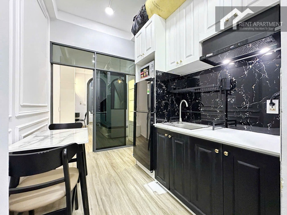 ID 2242 kitchen setup with black marble backsplash sink and dining table