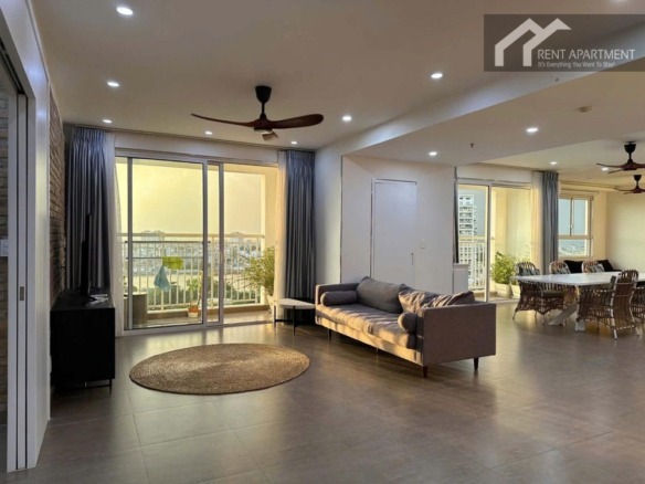 ID 2244 spacious living room with grey sofa round jute rug and balcony view