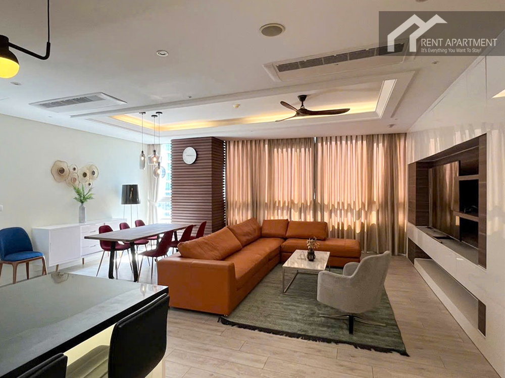 ID 2245 spacious living room with l shaped orange sofa and dining area
