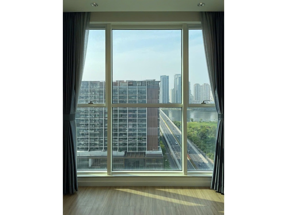 ID 2252 large window framing highway and river view in second bedroom