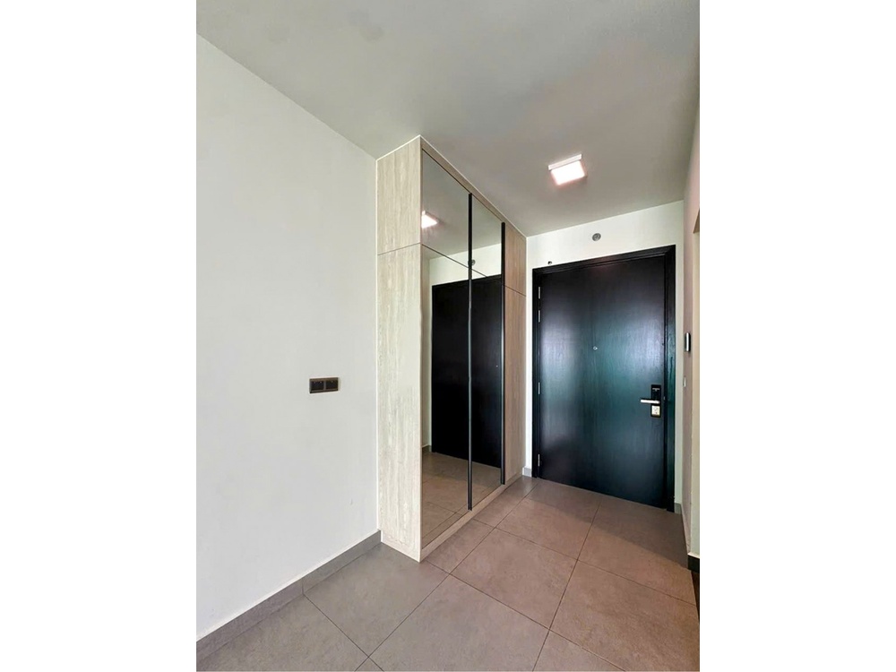 ID 2254 entrance hallway with wooden door and smart lock