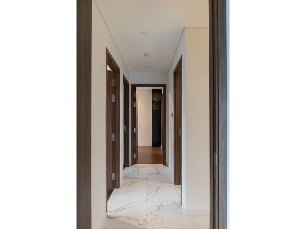 ID 2256 bright-interior-hallway-with-white-marble-tile-floor-connecting-bedrooms