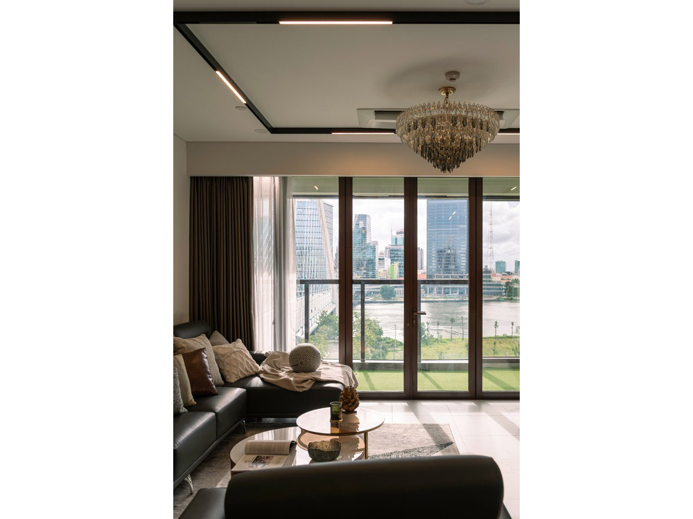 ID 2256 cozy sofa seating beside floor to ceiling panoramic river view windows