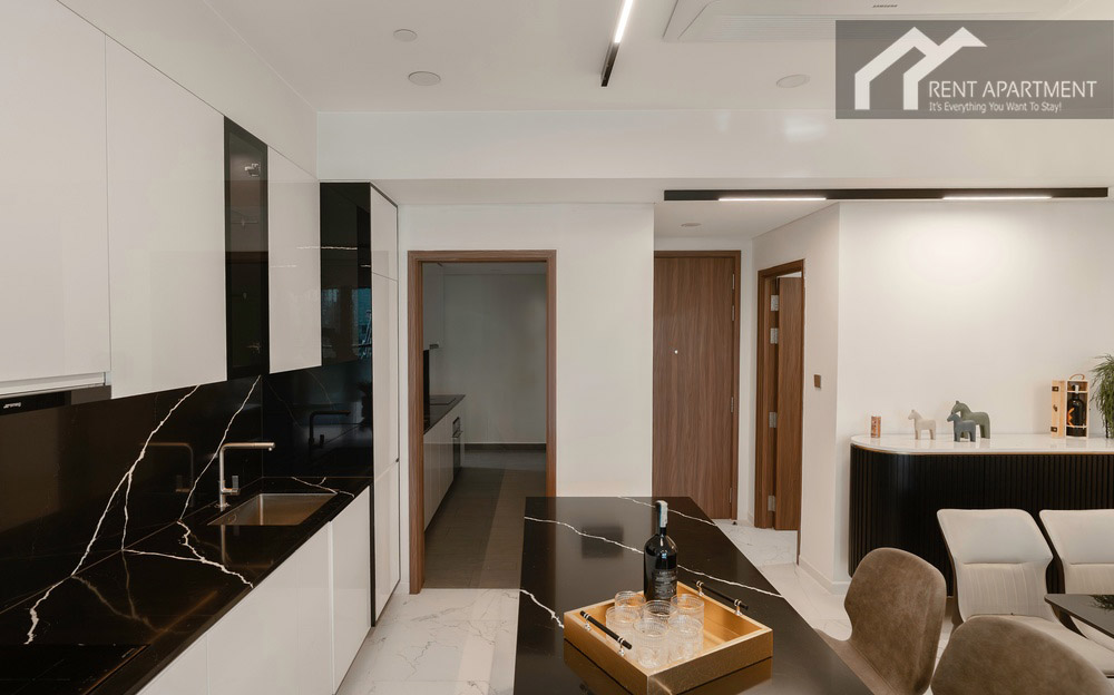 ID 2256 open kitchen and island counter leading to dining area and entrance