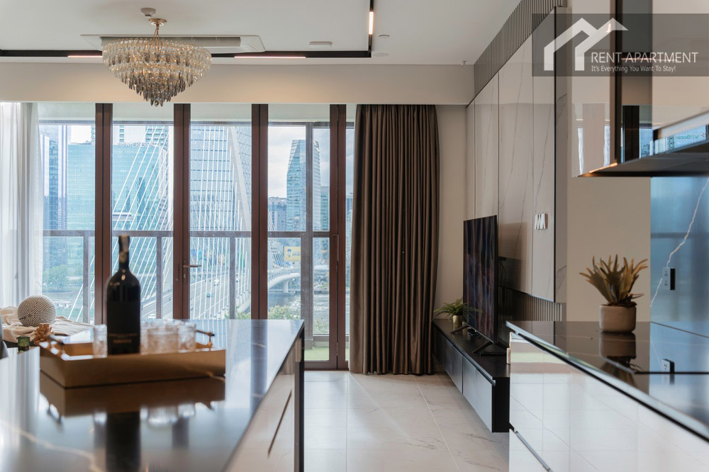 ID 2256 spacious living room with panoramic floor to ceiling bridge and river views.