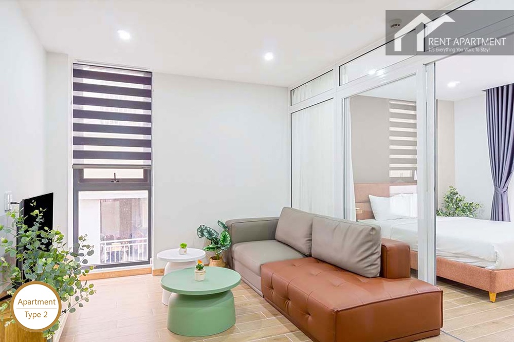 ID 2260 type 2 living room with leather sofa and glass partition to bedroom