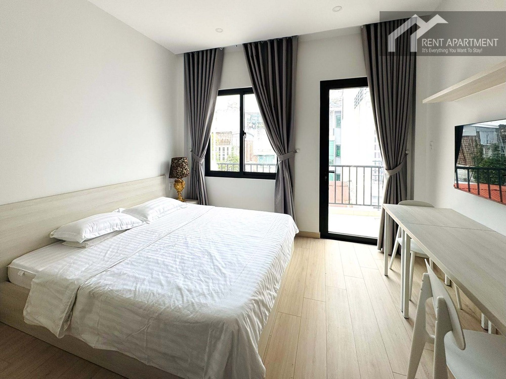 ID 2261 bright bedroom with double bed bedside lamp and balcony door