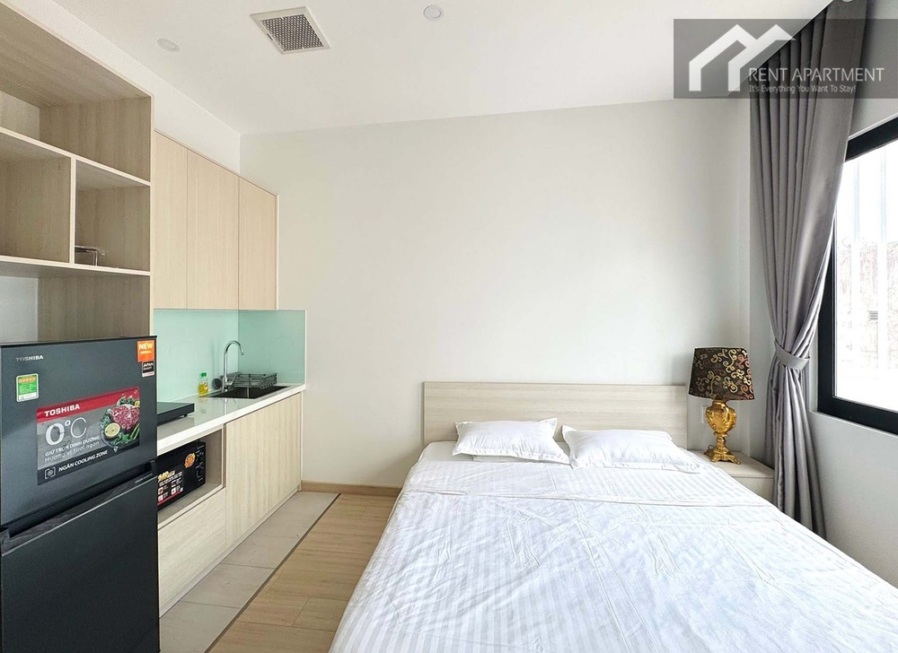 ID 2261 cozy studio bedroom with double bed and adjoining kitchen