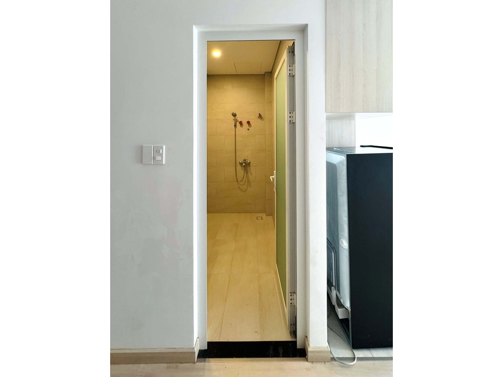 ID 2261 entrance doorway view into modern tiled bathroom with shower