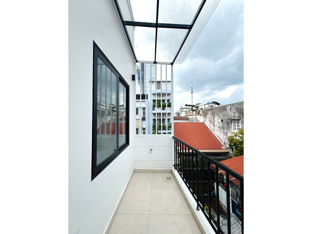 ID 2261 private outdoor balcony with glass canopy and open view