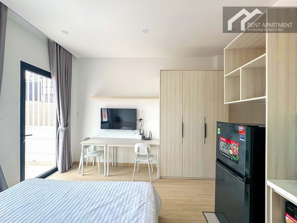 ID 2261 studio bedroom with desk wardrobe tv and balcony access