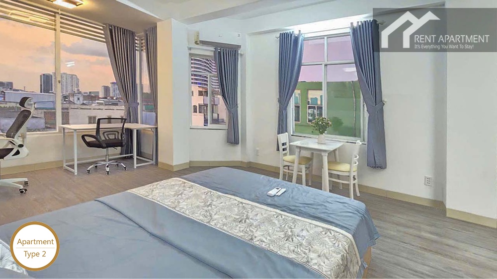 ID 2218 type 2 bright bedroom with double bed work desk and city view windows