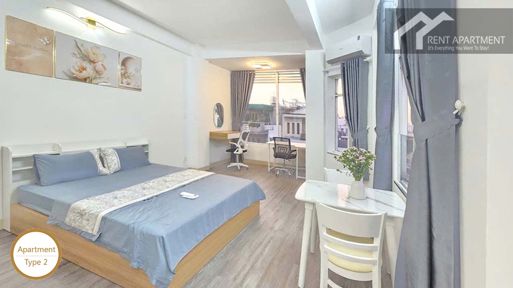 ID 2218 type 2 studio bedroom with double bed dining table and workspace windows