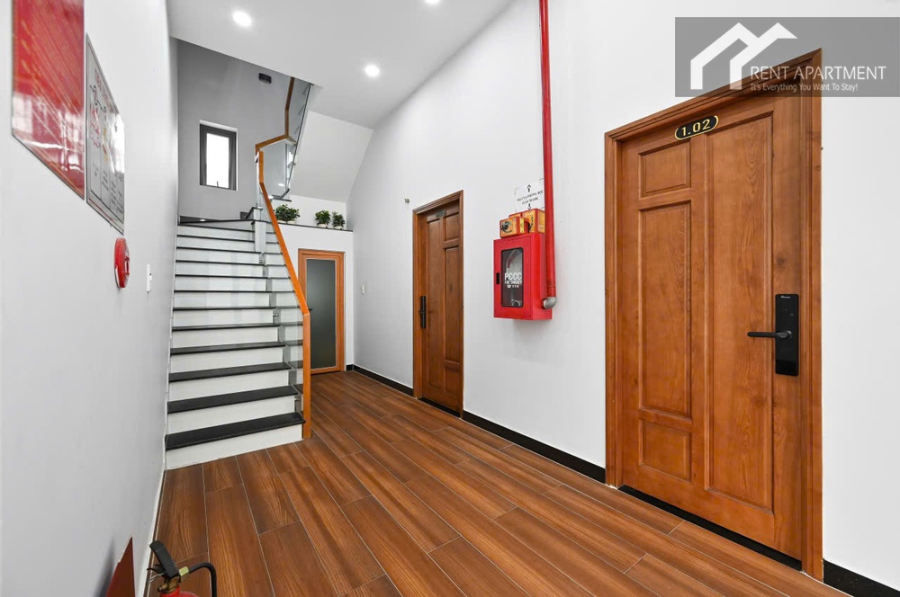 ID 2223 building entrance hallway with staircase and wooden apartment doors