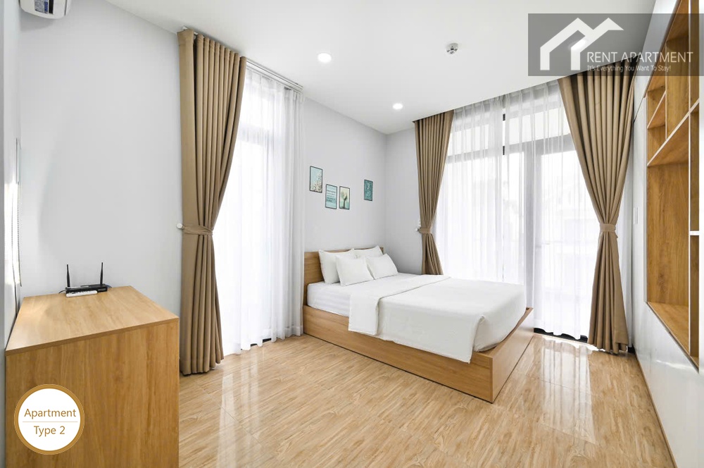 ID 2223 type 2 bright bedroom with double bed and dual aspect balcony windows
