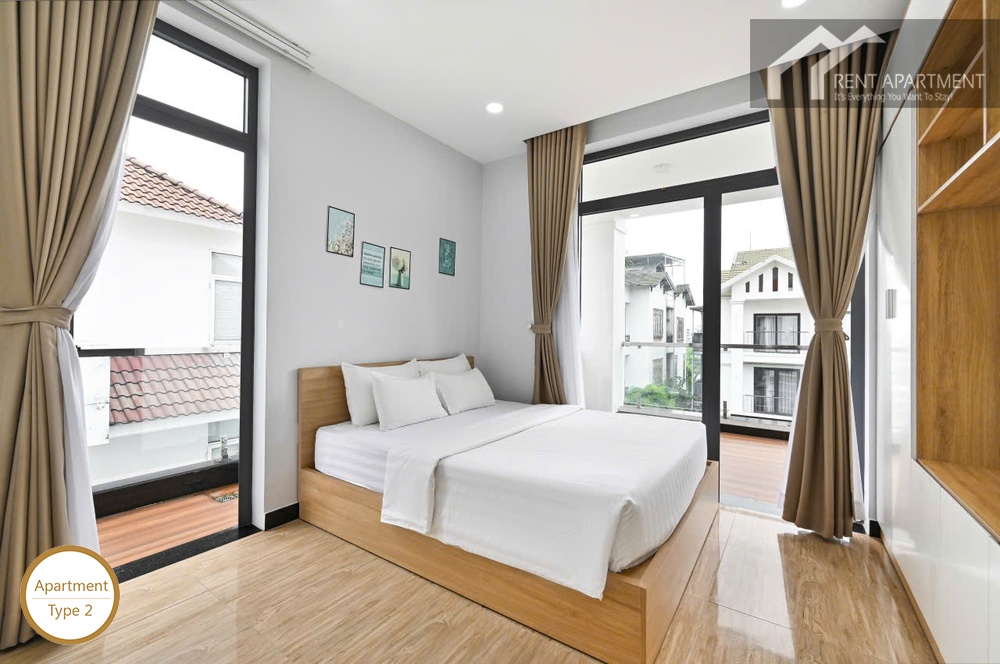 ID 2223 type 2 double bed between two large balcony glass doors
