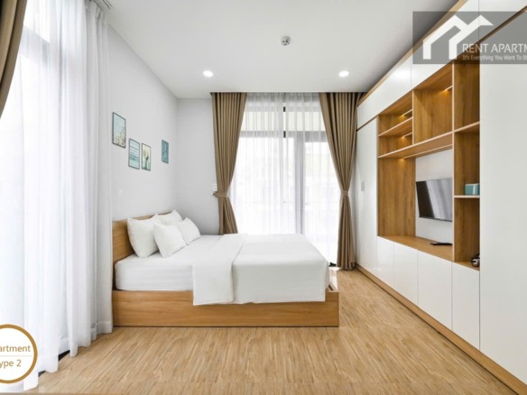 ID 2223 type 2 studio bedroom with wooden platform bed and integrated wardrobe unit