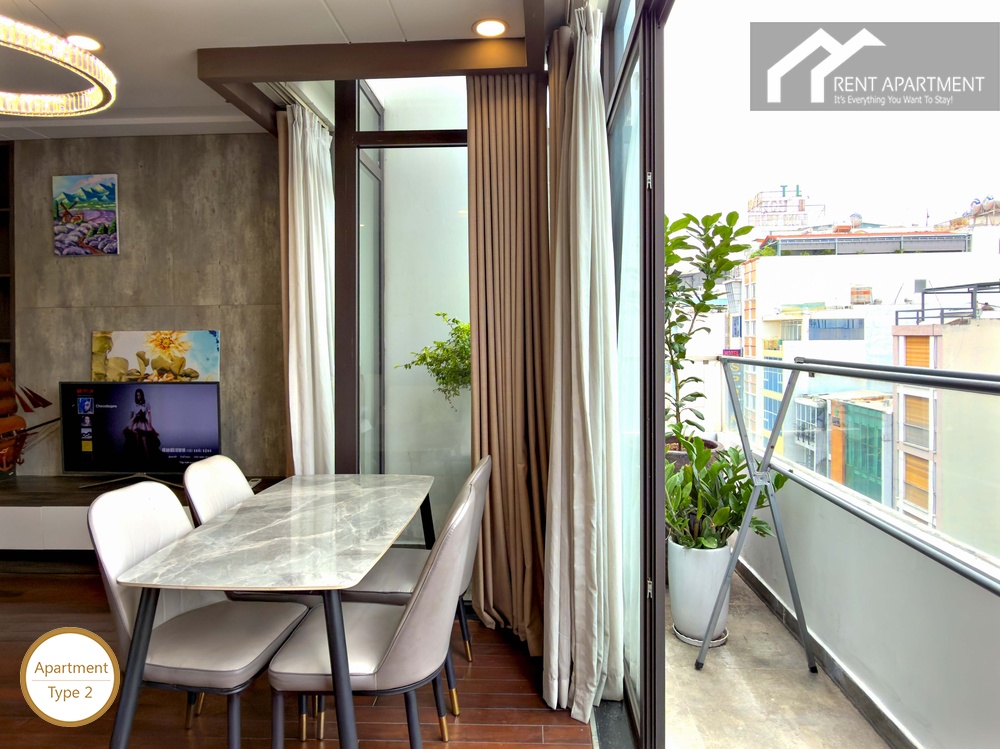 ID 2262 type 2 dining space open to private balcony with potted plants and city view