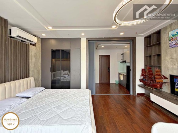ID 2262 type 2 spacious bedroom with modern wardrobe bed and doorway to kitchen