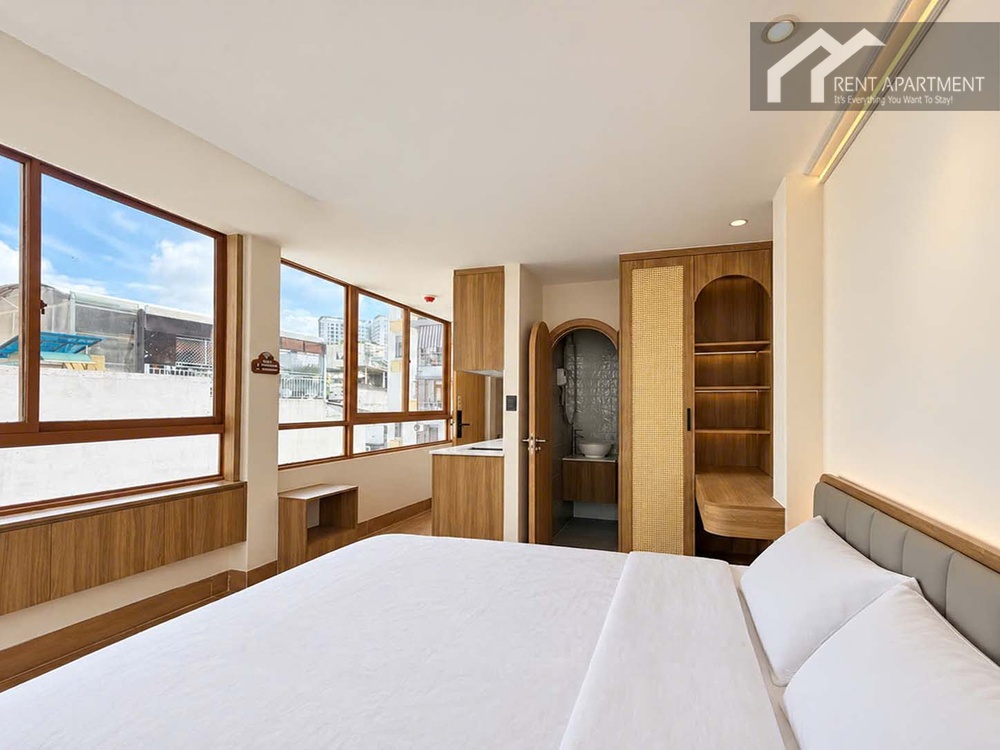 ID 2263 bedroom interior with double bed wooden wardrobe and bathroom entrance