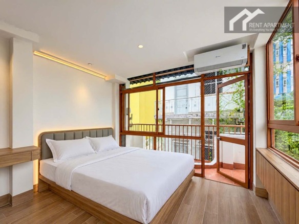ID 2263 bedroom with comfortable double bed and glass door leading to balcony