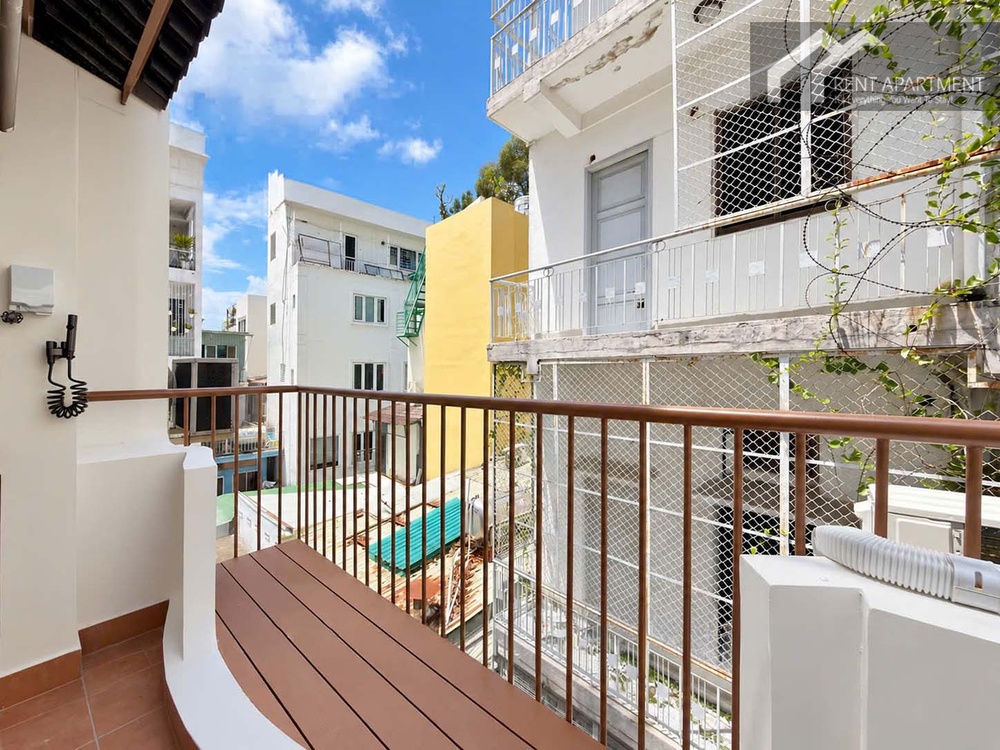 ID 2263 private outdoor balcony with wooden decking and neighborhood view