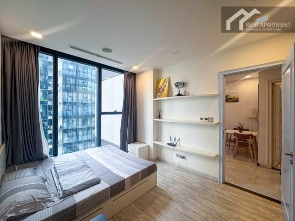 ID 2268 bedroom with platform bed wall display shelves and doorway to dining area