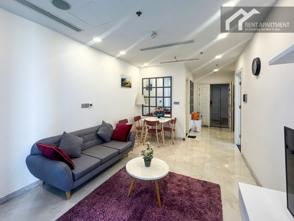ID 2268 spacious living and dining area with grey sofa decorative mirror and entry hallway