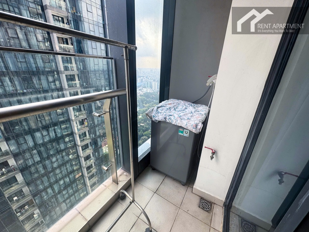 ID 2268 utility balcony with washing machine clothes drying rack and city view